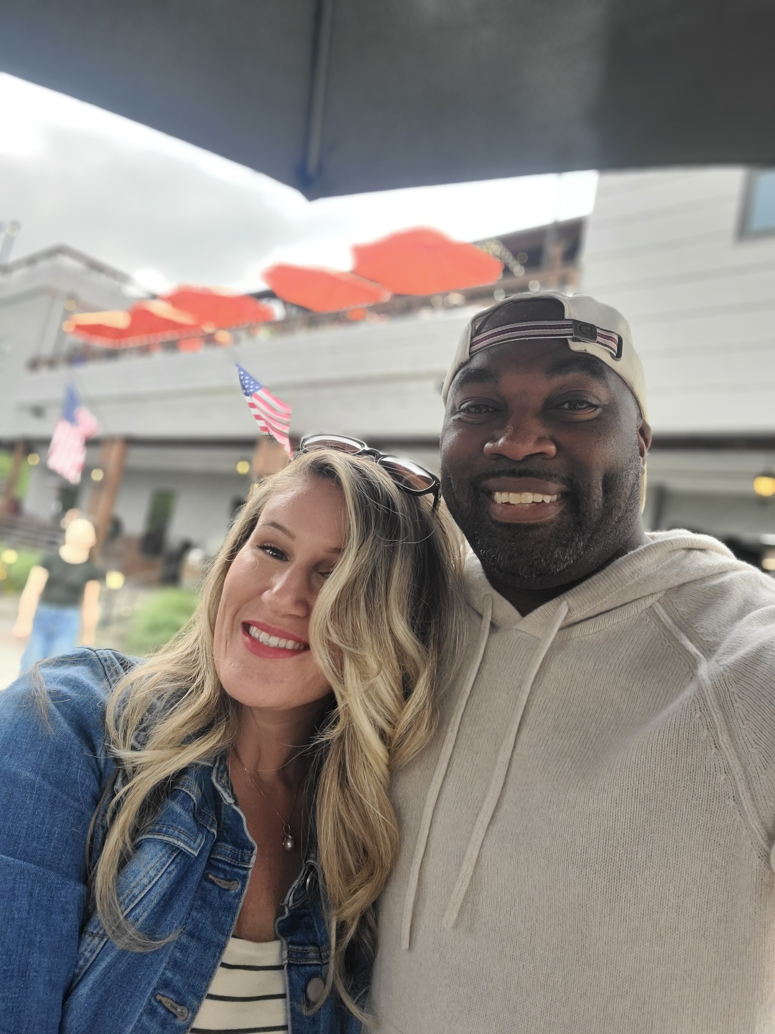 Drew and Sarah smiling together in a relaxed outdoor selfie